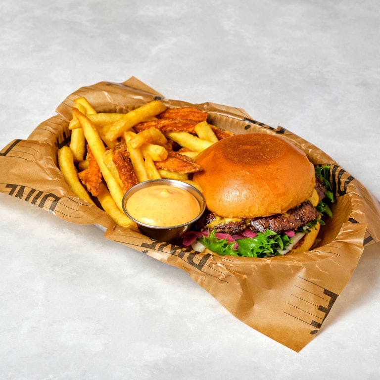 Hamburger with fries and dip sauce