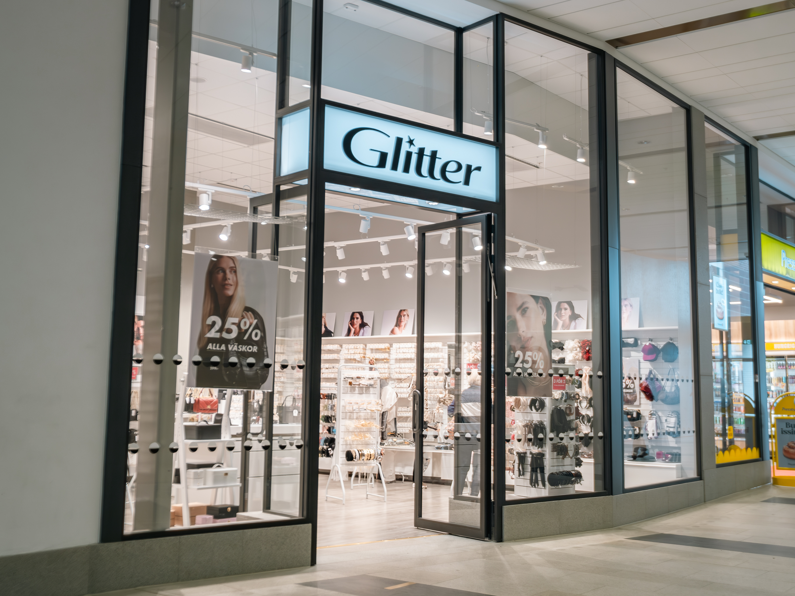 Butiksfasad Glitter Lilla Klädpressaregatan