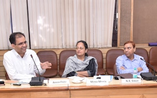 Arash Fazli (left), of India’s Baha’i community, speaks during a roundtable discussion in July about media coverage of religion. The event, held at the Indian Institute of Mass Communication in New Delhi, brought together prominent media figures, government officials, scholars, and faith representatives.