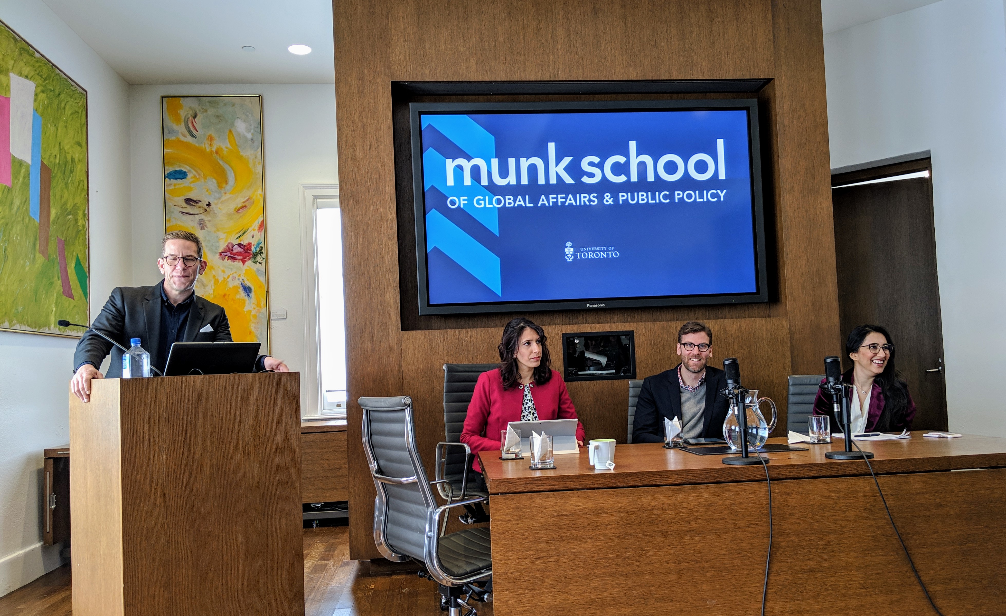 (l to r) Craig Smith, from the Munk School of Global Affairs and Public Policy, chaired panel presentations from Shachi Kurl, Executive Director of the Angus Reid Institute, Geoffrey Cameron, Director of the Office of Public Affairs of the Baha'i Community of Canada, and journalist Sadia Rafiquddin.