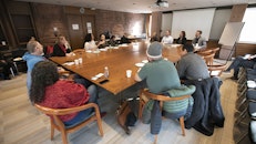 How does religion influence the civic participation of immigrant populations?