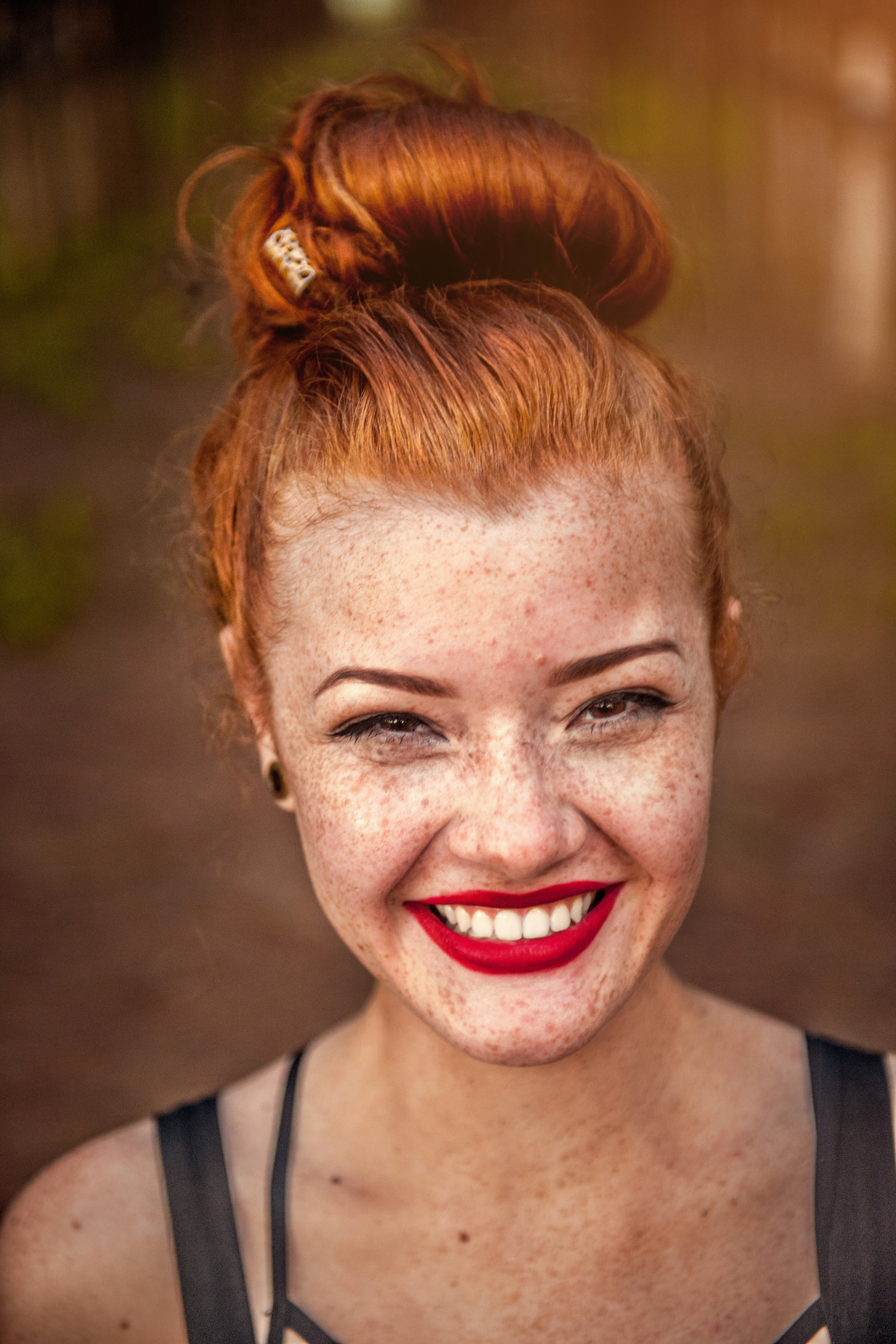 Red hair girl smiling