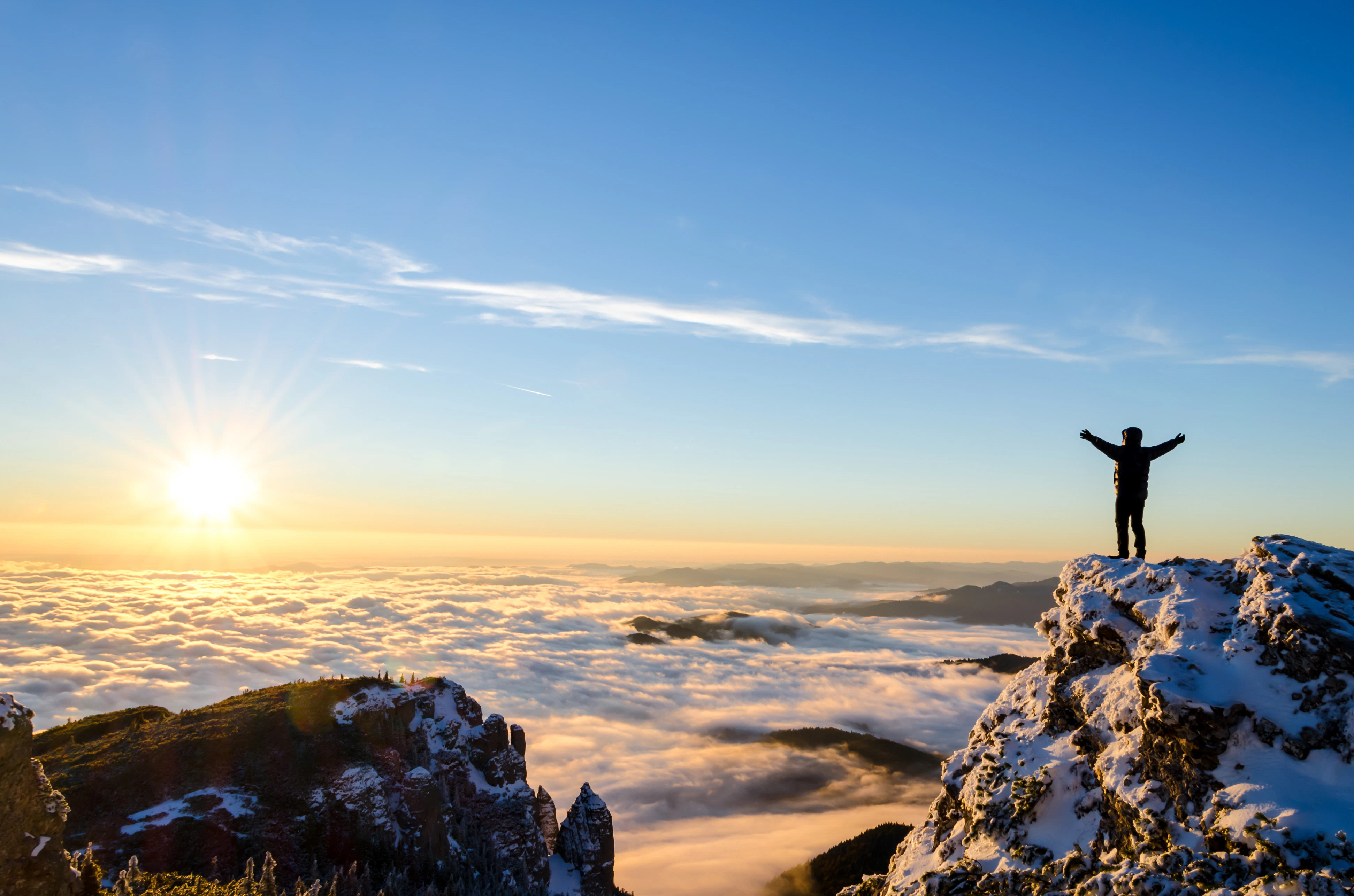 A person standing on a mountain