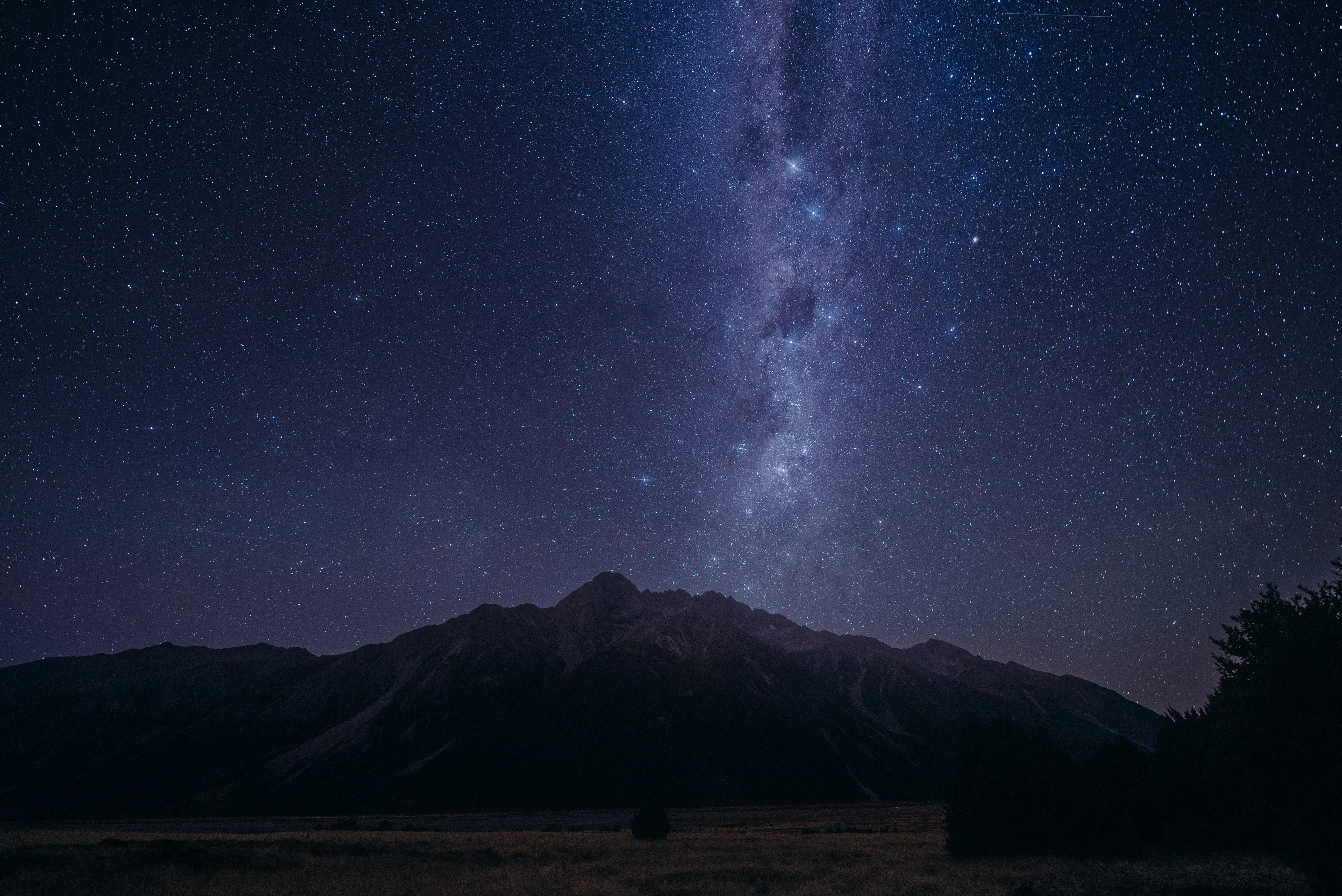 Starry Night Sky Above Mountain Range