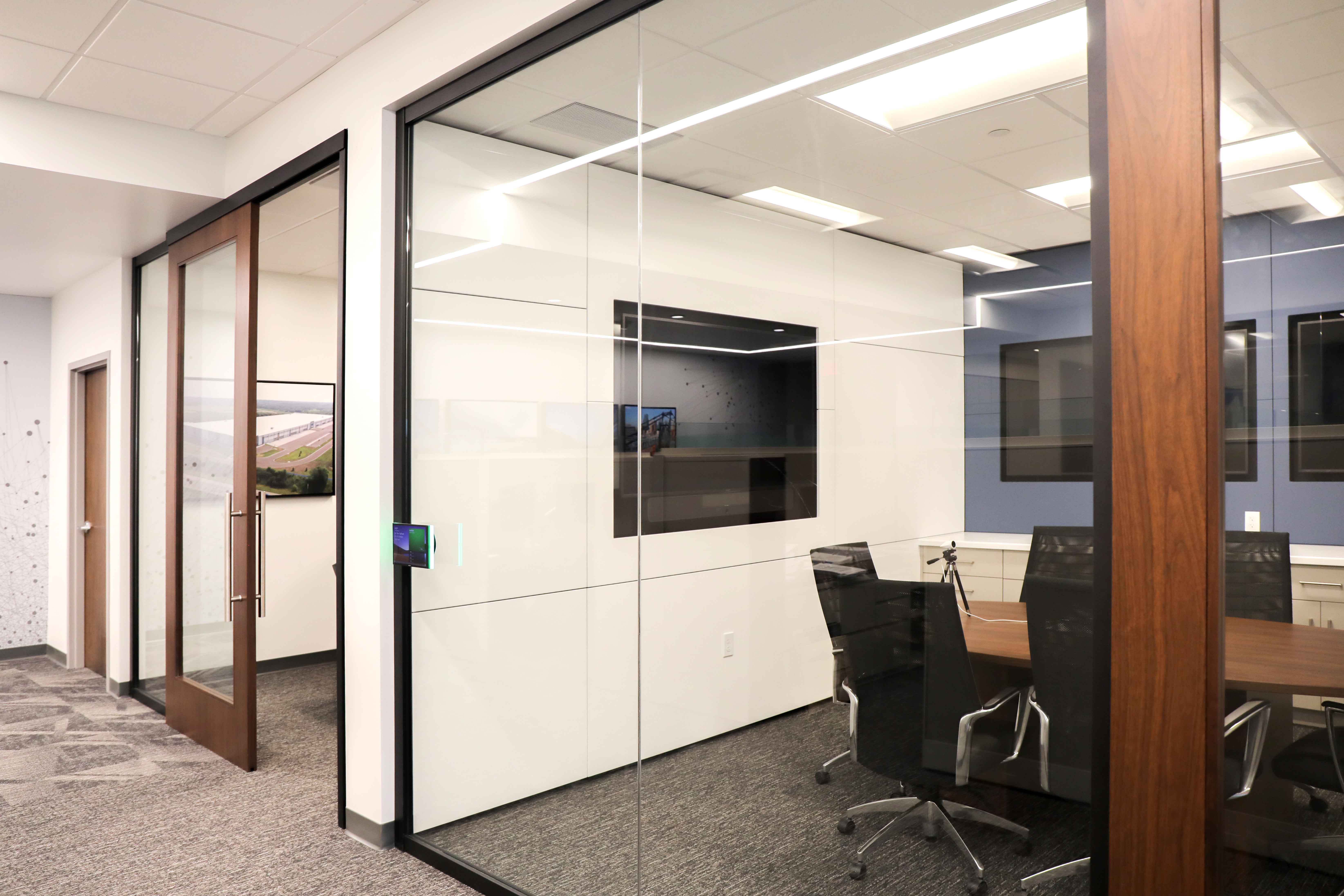 Falkbuilt Kansas City commercial + office glass wall solid wall