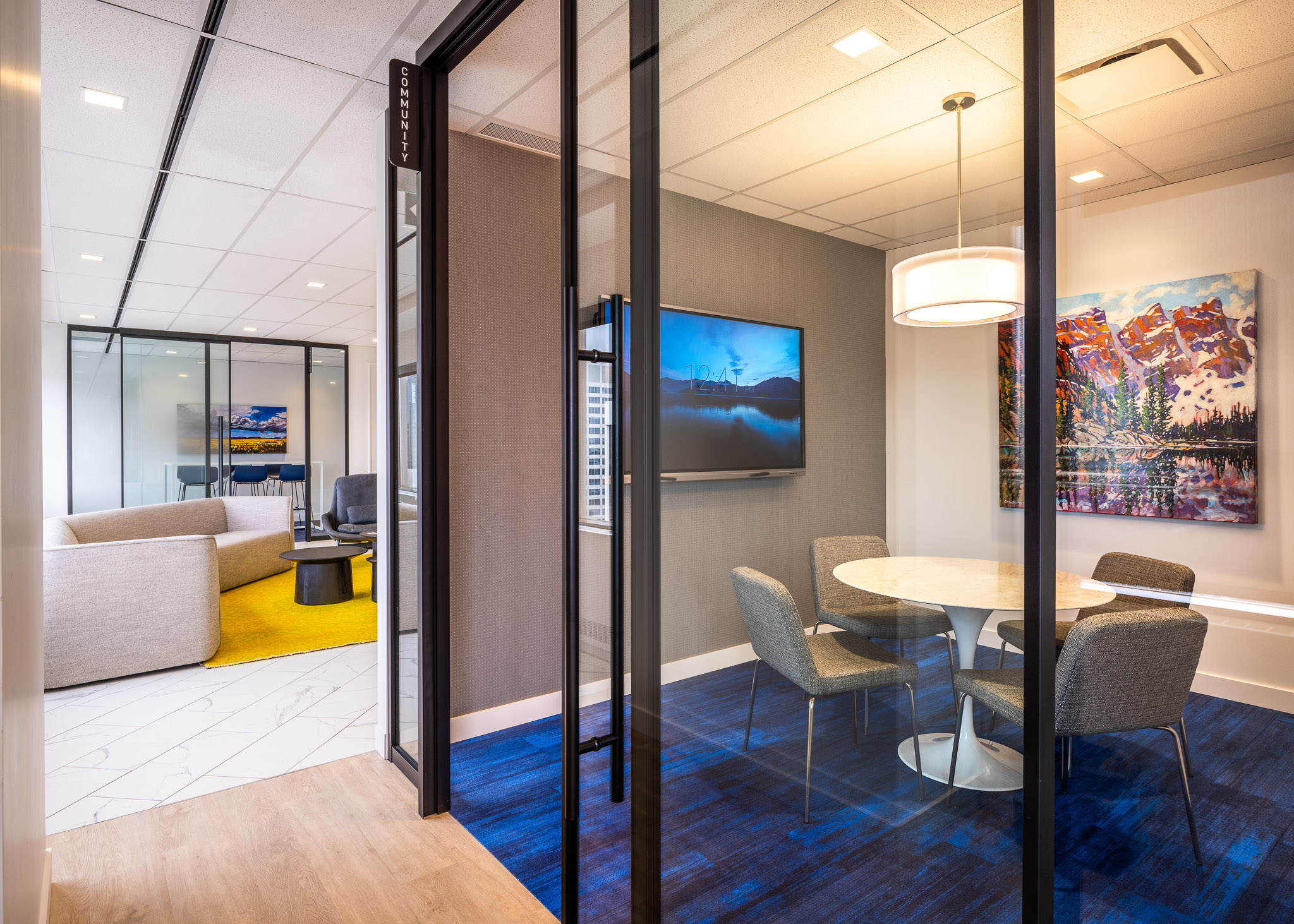 Interior view showcasing Falkbuilt's glass wall construction in a corporate setting.