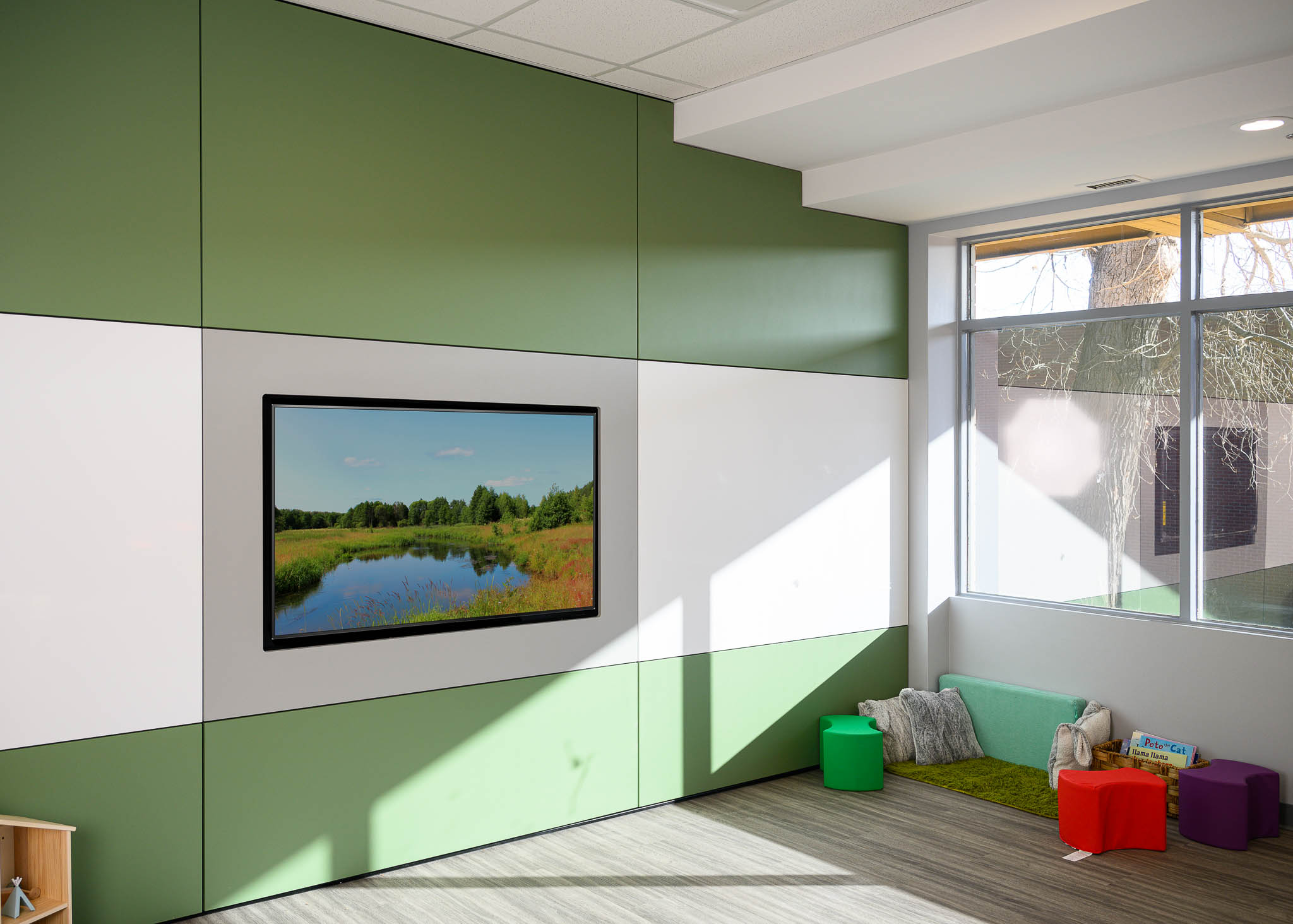 Interior view showcasing Falkbuilt's solid wall construction in an education setting with solid cladding and integrated technology