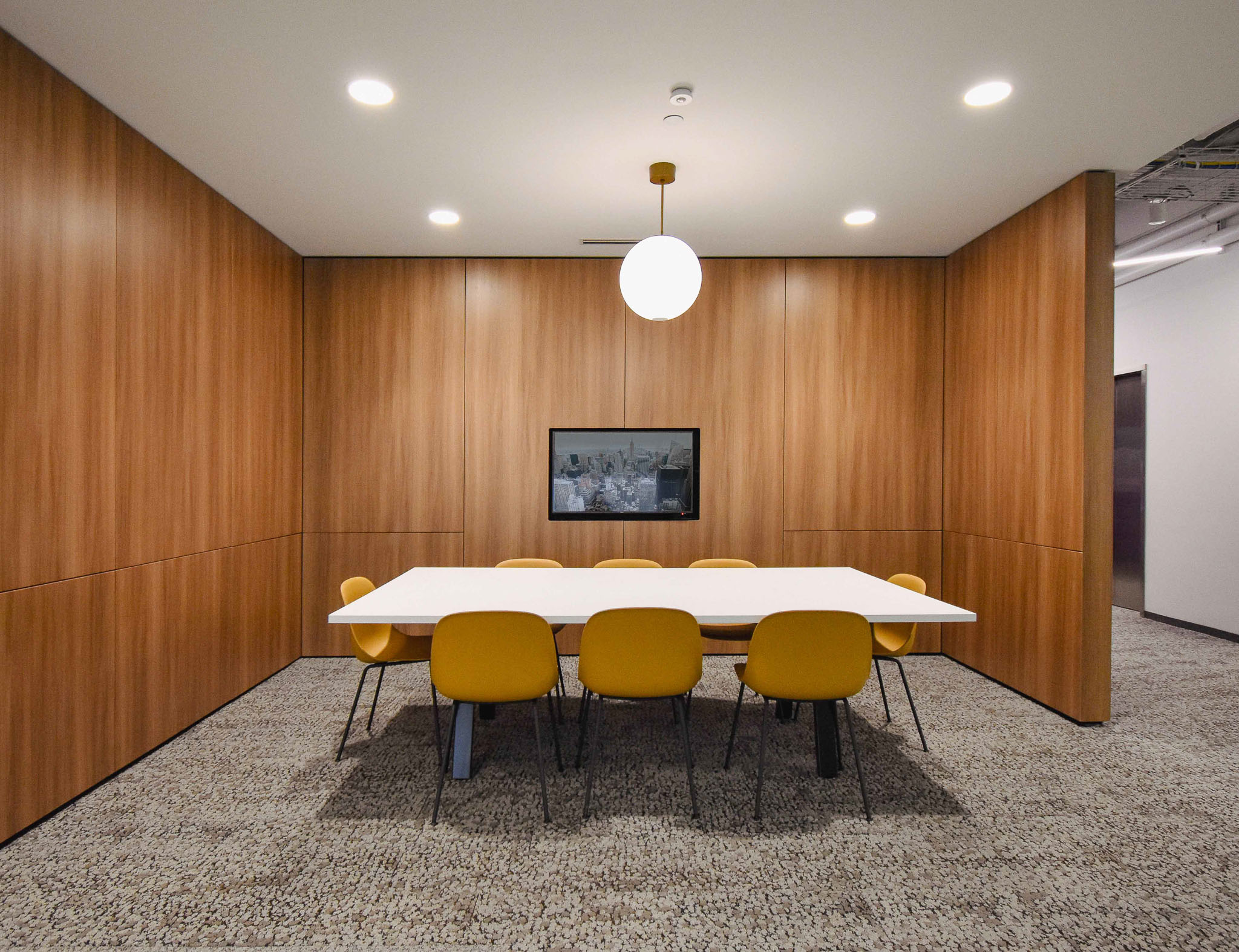 Interior view showcasing Falkbuilt's solid wall construction in a corporate setting with solid cladding and integrated technology