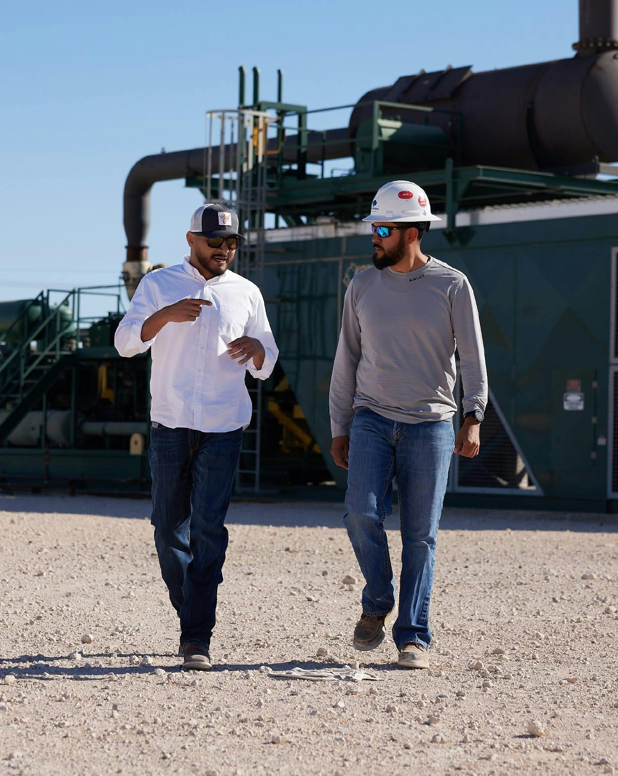 2 guys walking and talking