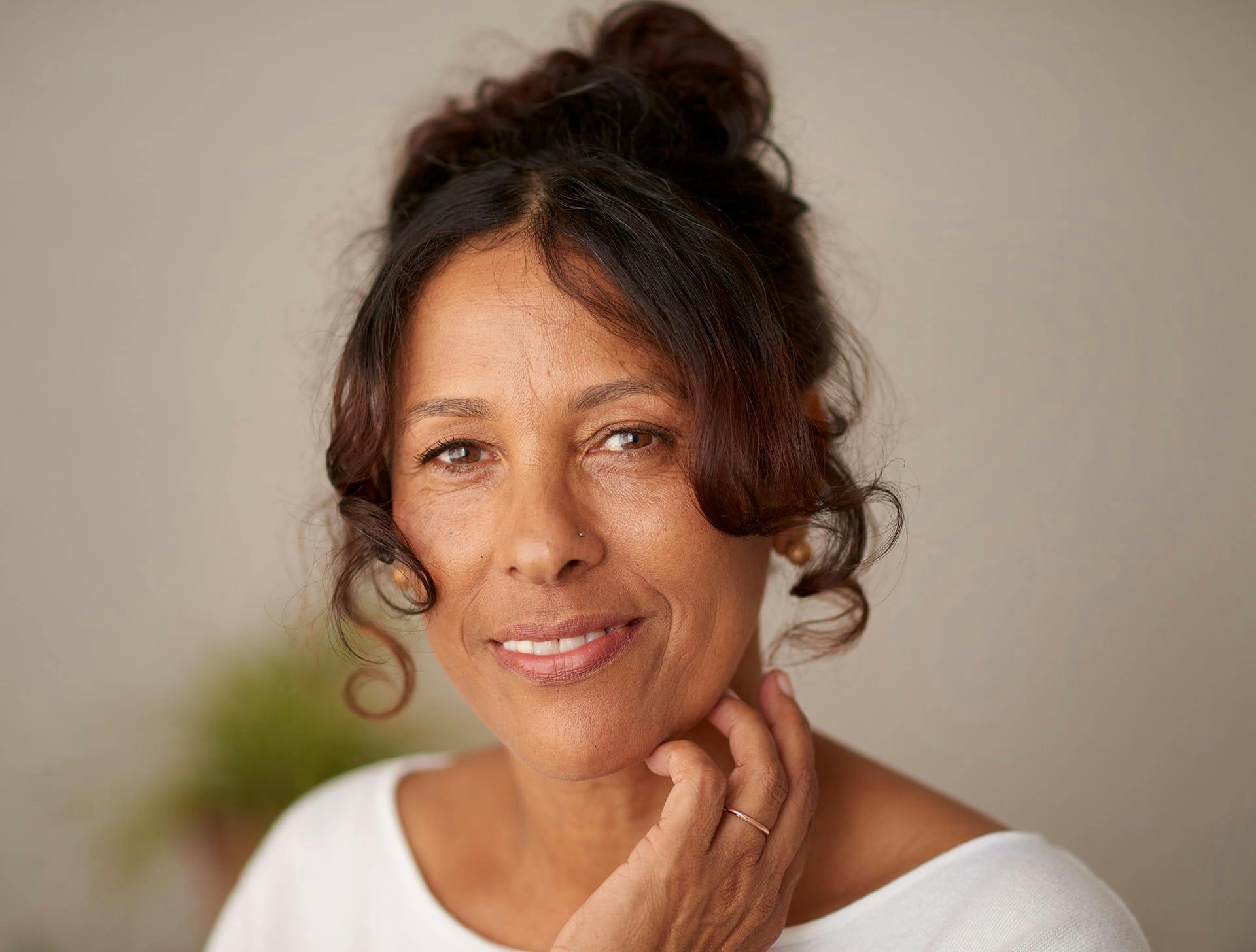 older woman with pinned up hair