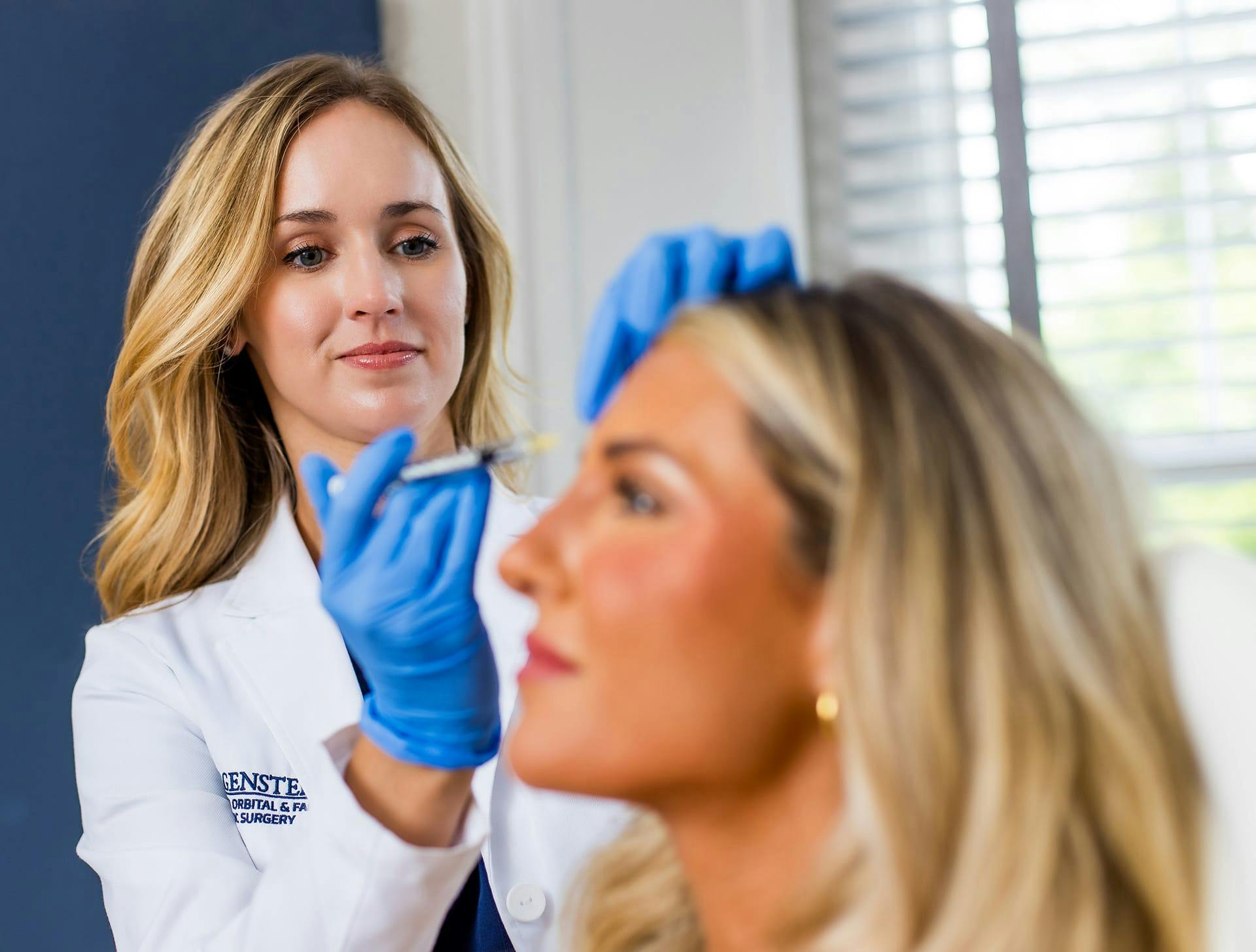 nurses injecting into client's temple