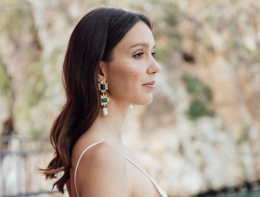 woman looking to the right with brown hair