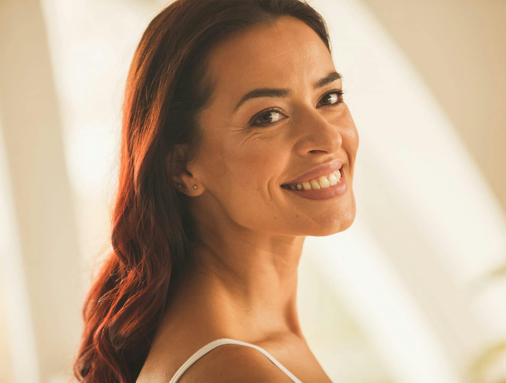 woman with wavy brown hair