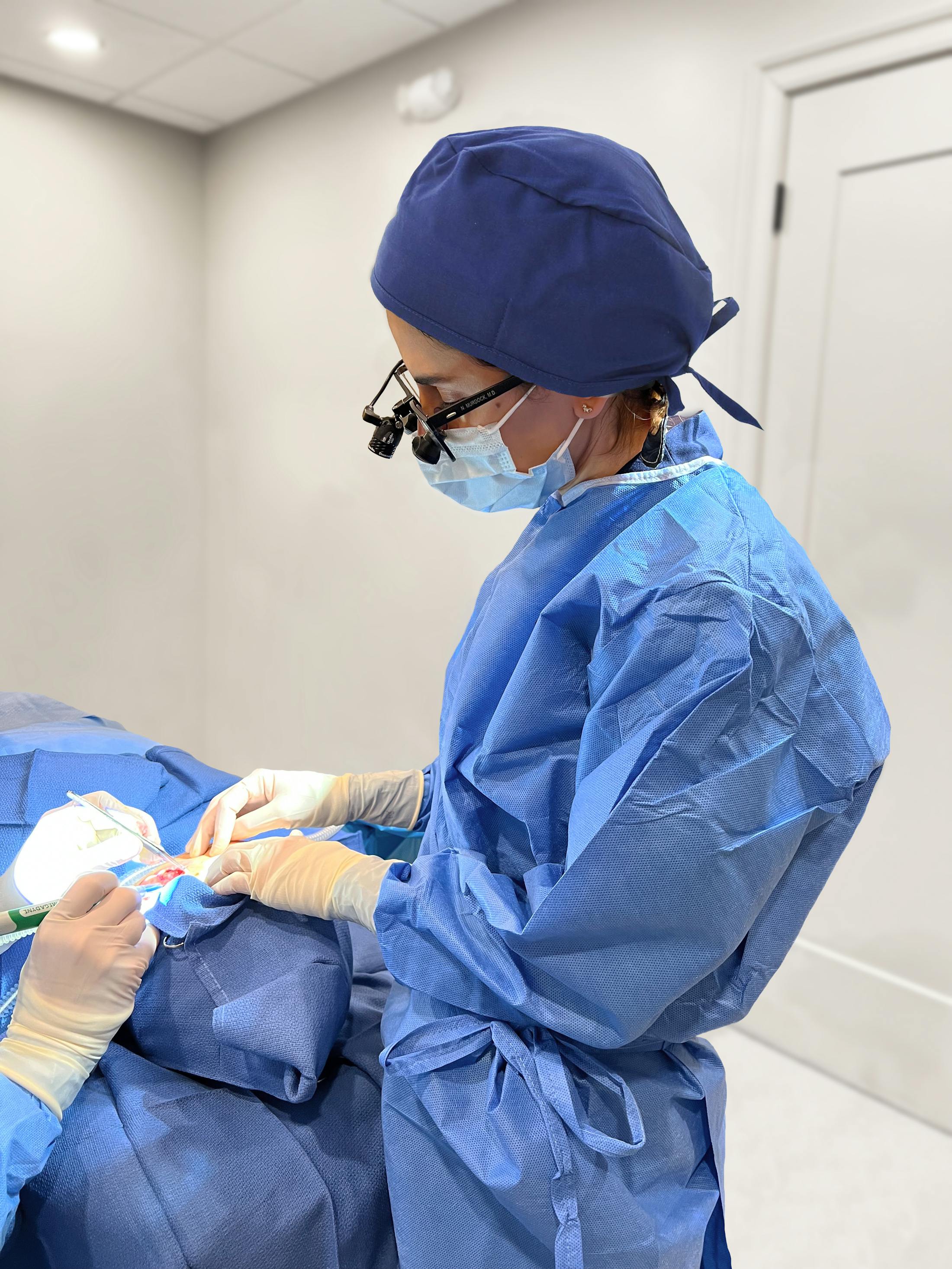 Dr. Murdock performing surgery