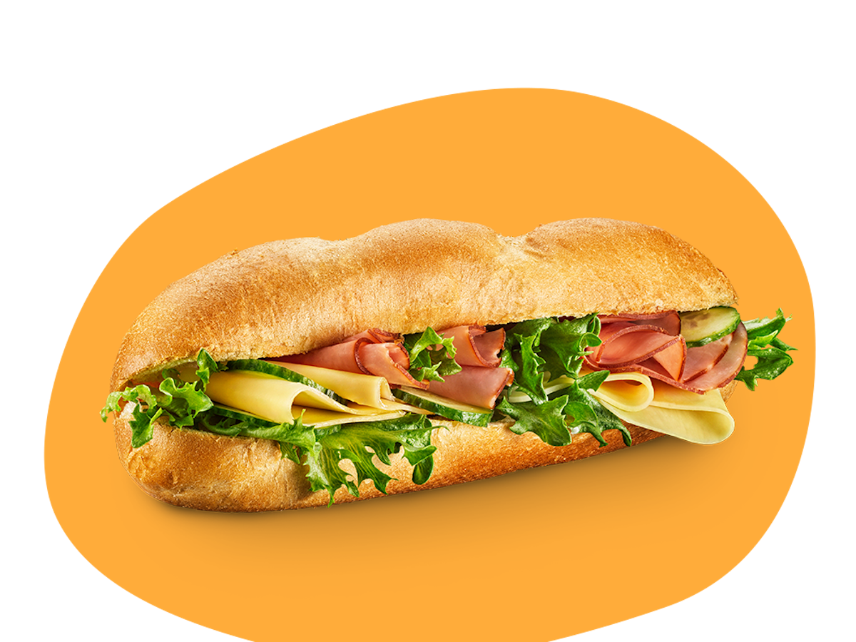 En baguette med ost, skinka, sallad och gurka