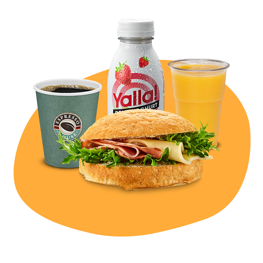 En kopp kaffe, en Yalla-yogurt, ett glas apelsinjuice och en frukostfralla