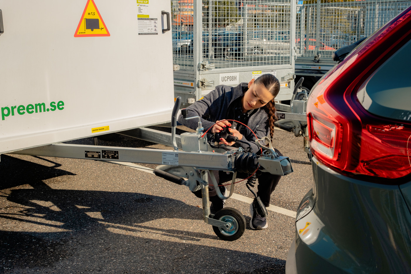 Kvinna med släpvagn.
