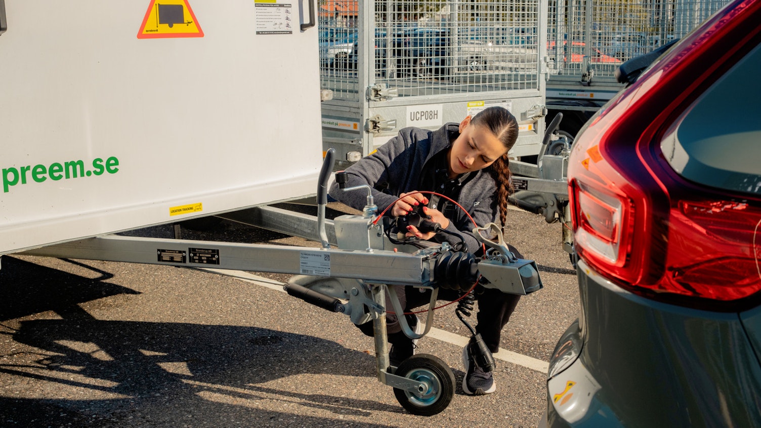 Kvinna med släpvagn.