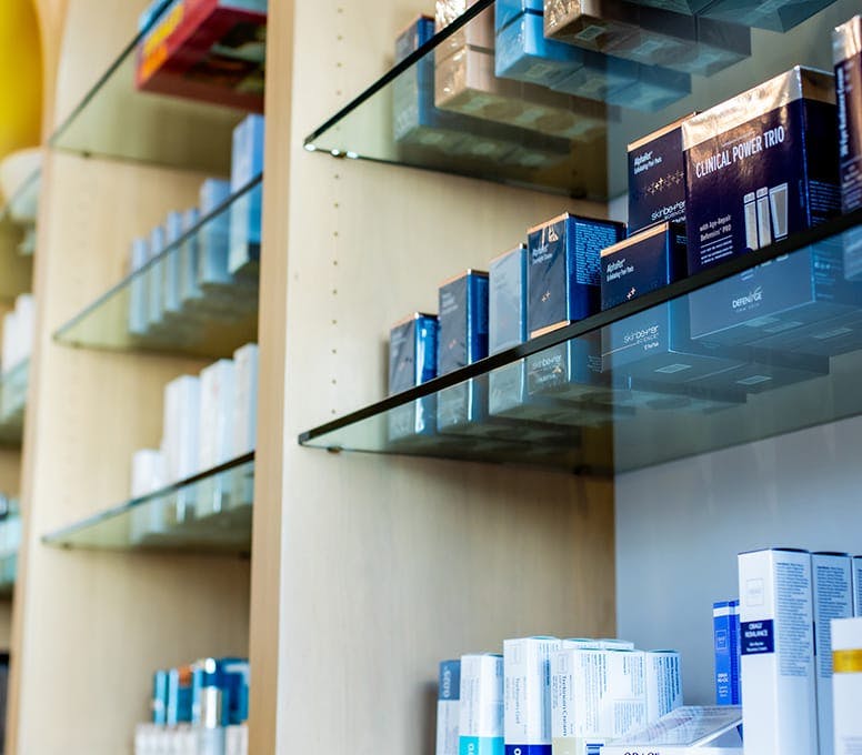 close up of shelves full of skincare
