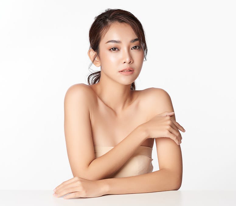woman leaning on table