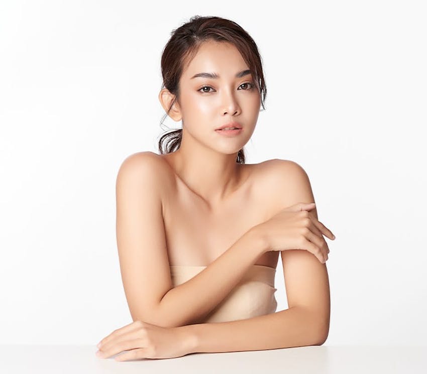 woman leaning on table