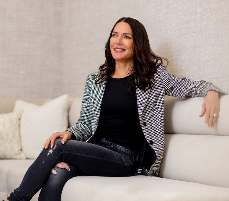 woman sitting on couch