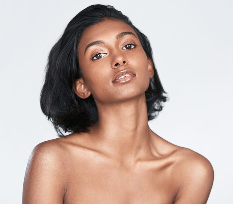 woman with short hair looking forward