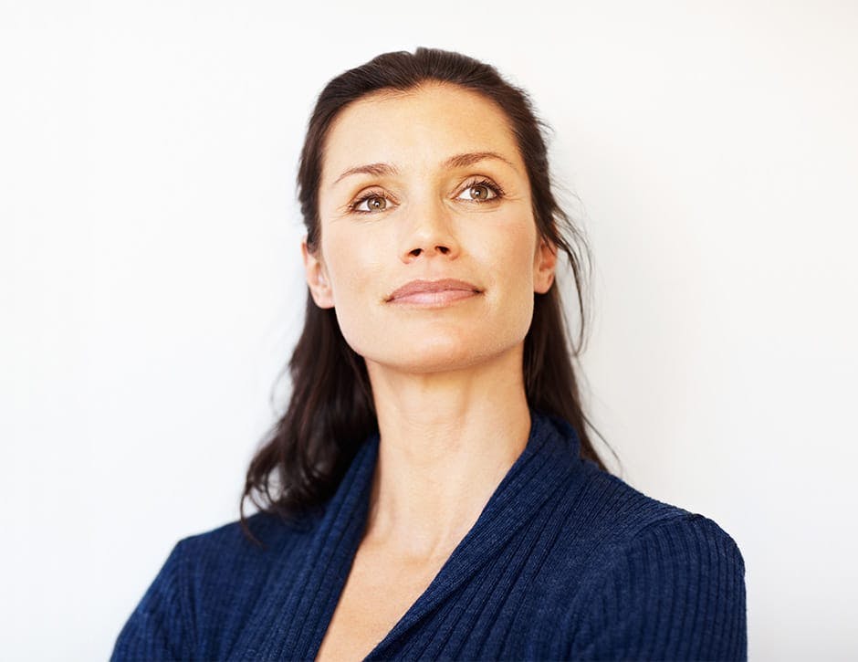 woman looking forward in navy blue top