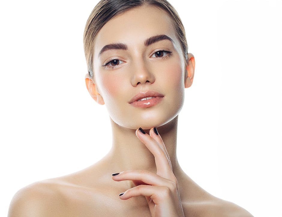 woman with her finger touching her chin