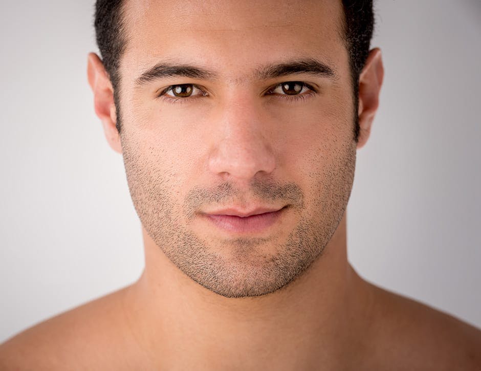 close up of a man's face looking forward