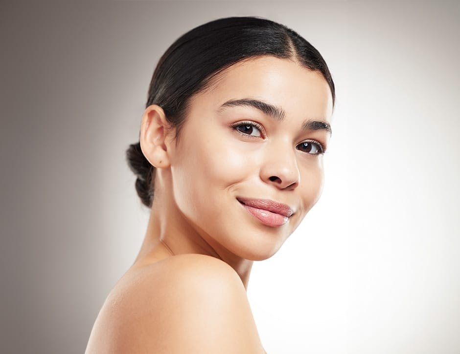 woman looking over her shoulder