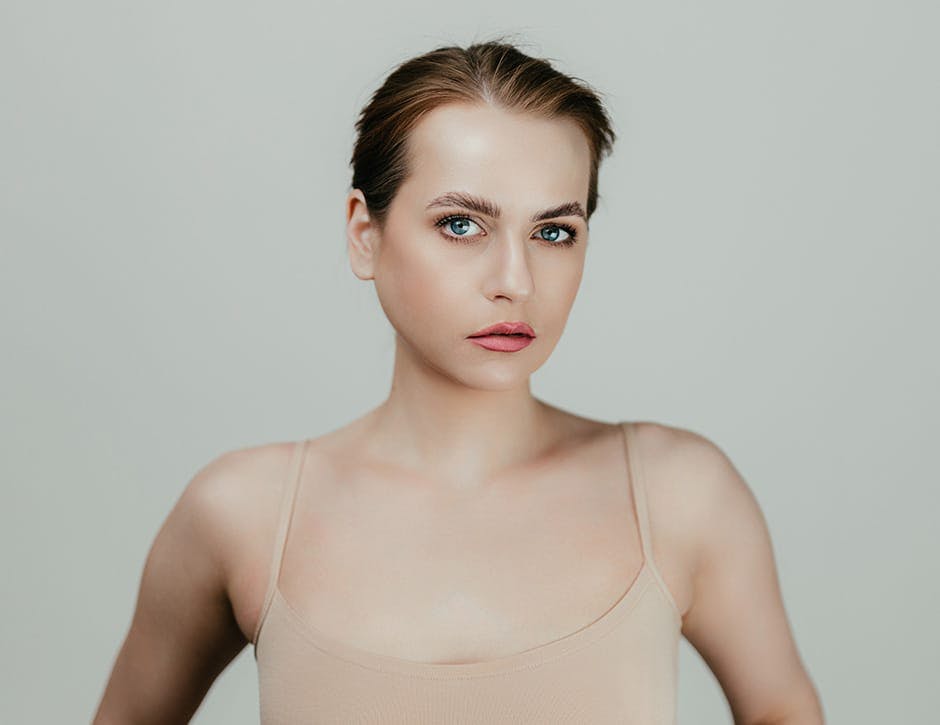 woman with her arms behind her looking forward