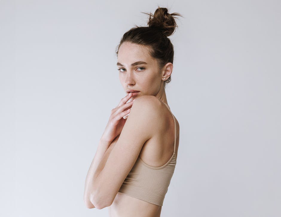 woman looking over her shoulder