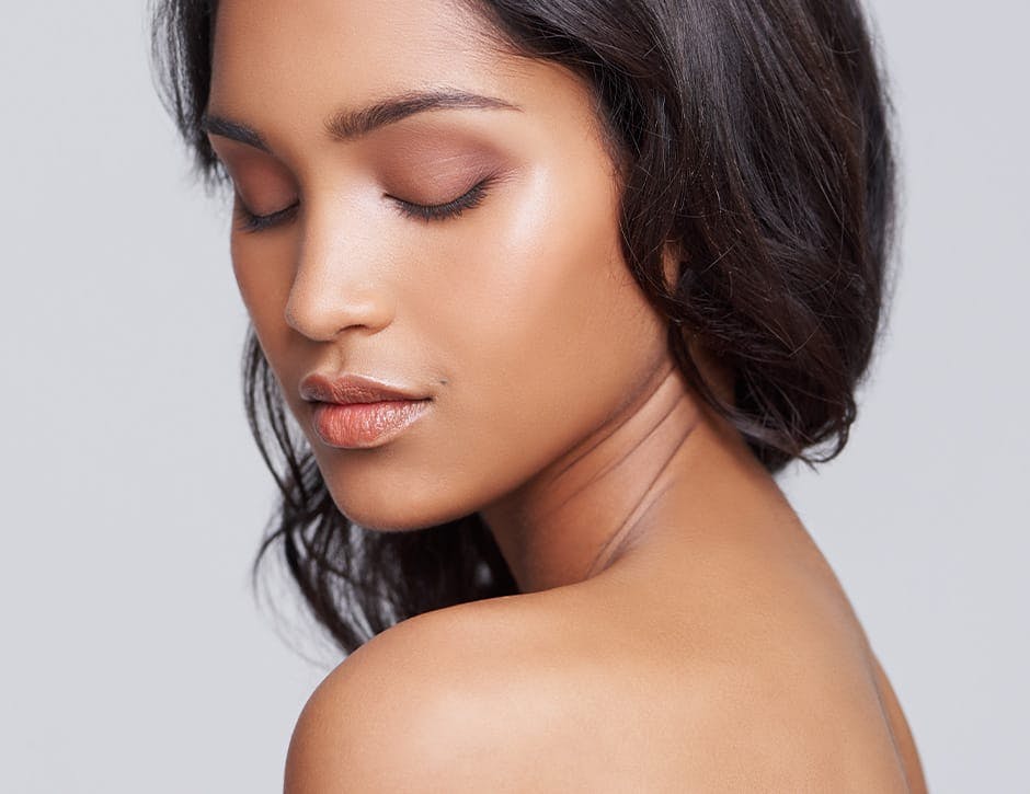 woman looking over her shoulder