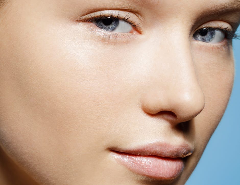 close up of woman with blue eyes