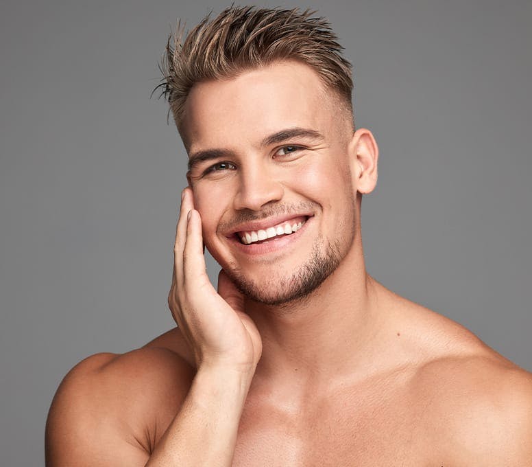 man smiling after laser skin resurfacing