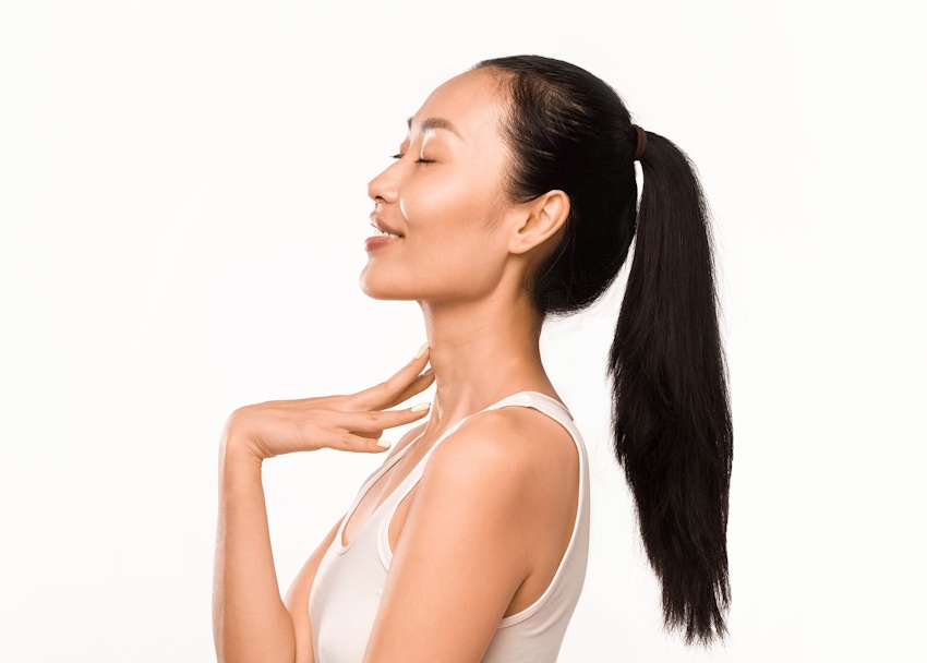 Woman with hair in ponytail