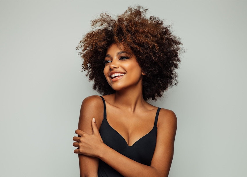 Woman in black top smiling