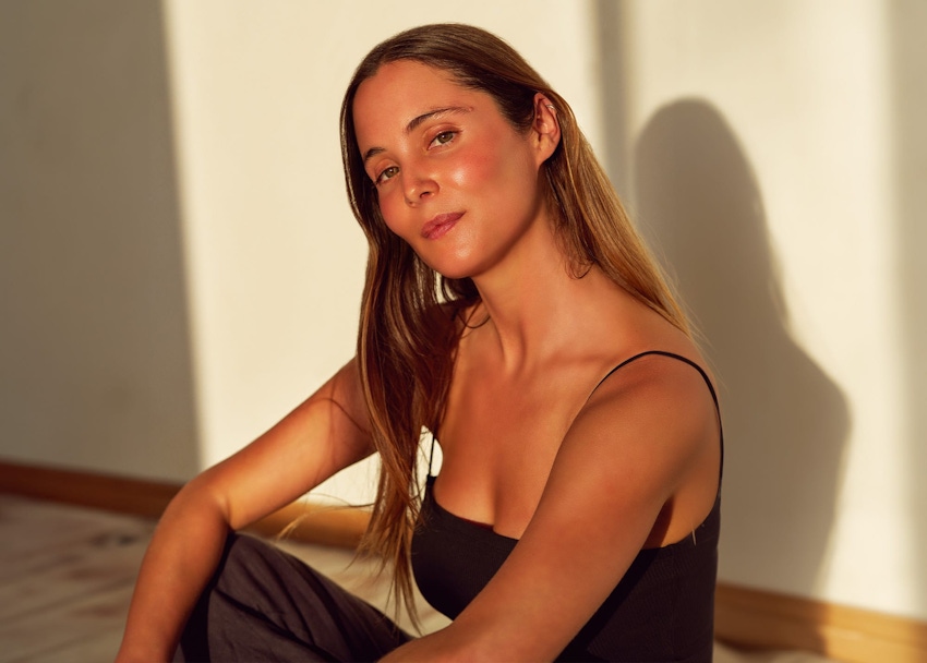 Woman in black top smiling