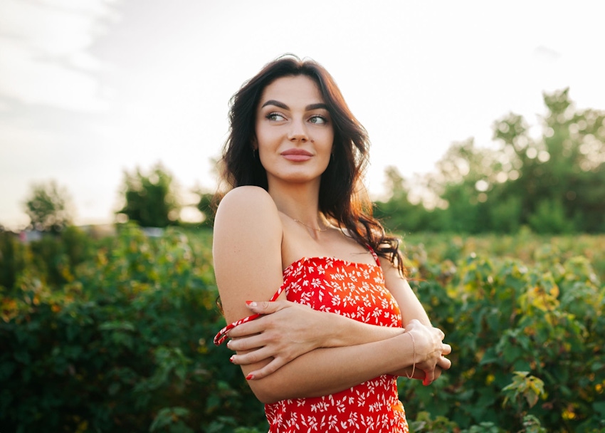 Woman outside wearing patterned dress