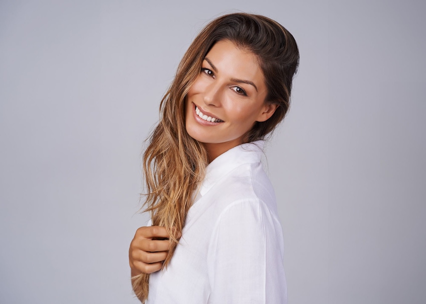 Nurse and patient looking in mirror