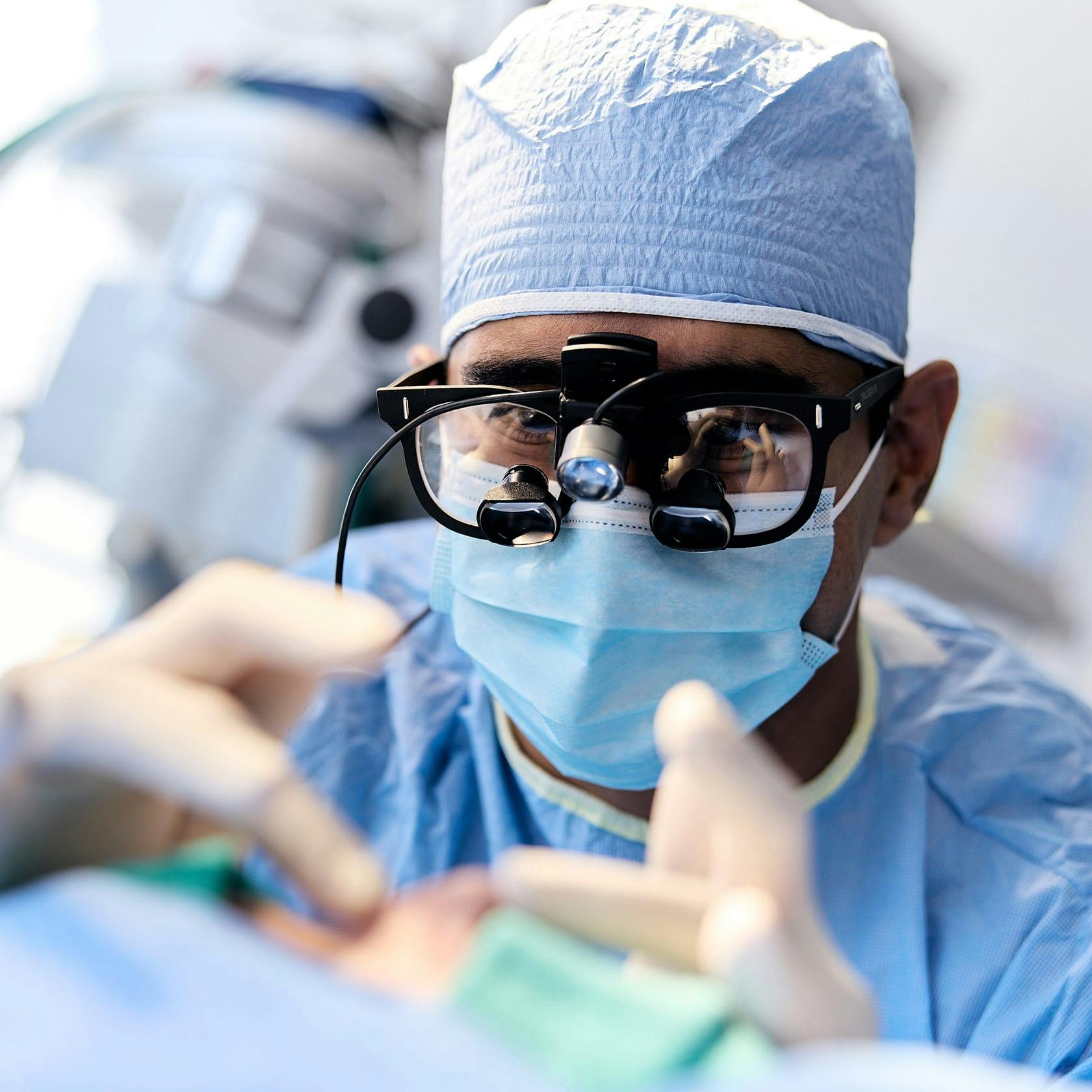Dr. Dugar working on a patient's nose