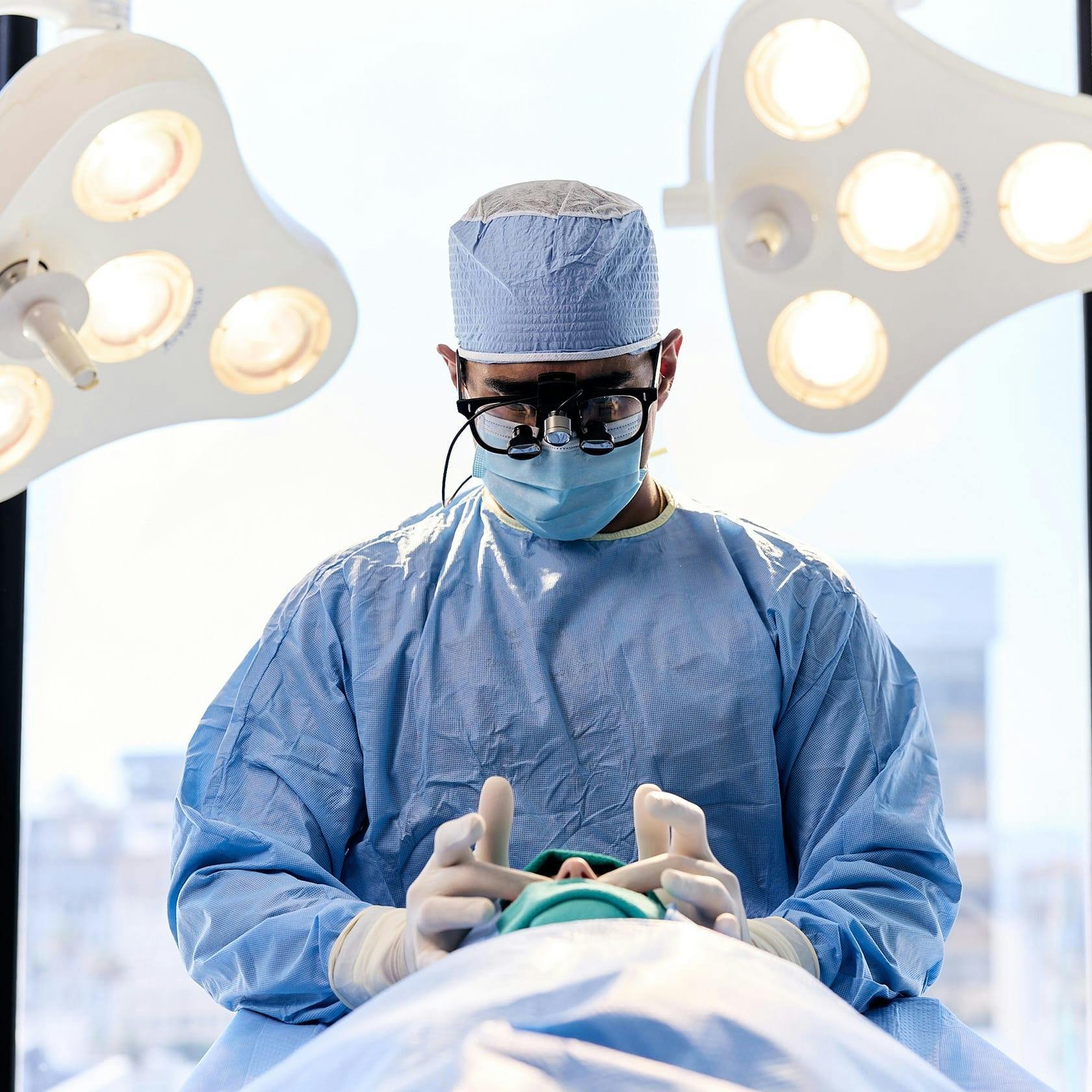 Dr. Dugar working on a patient's nose