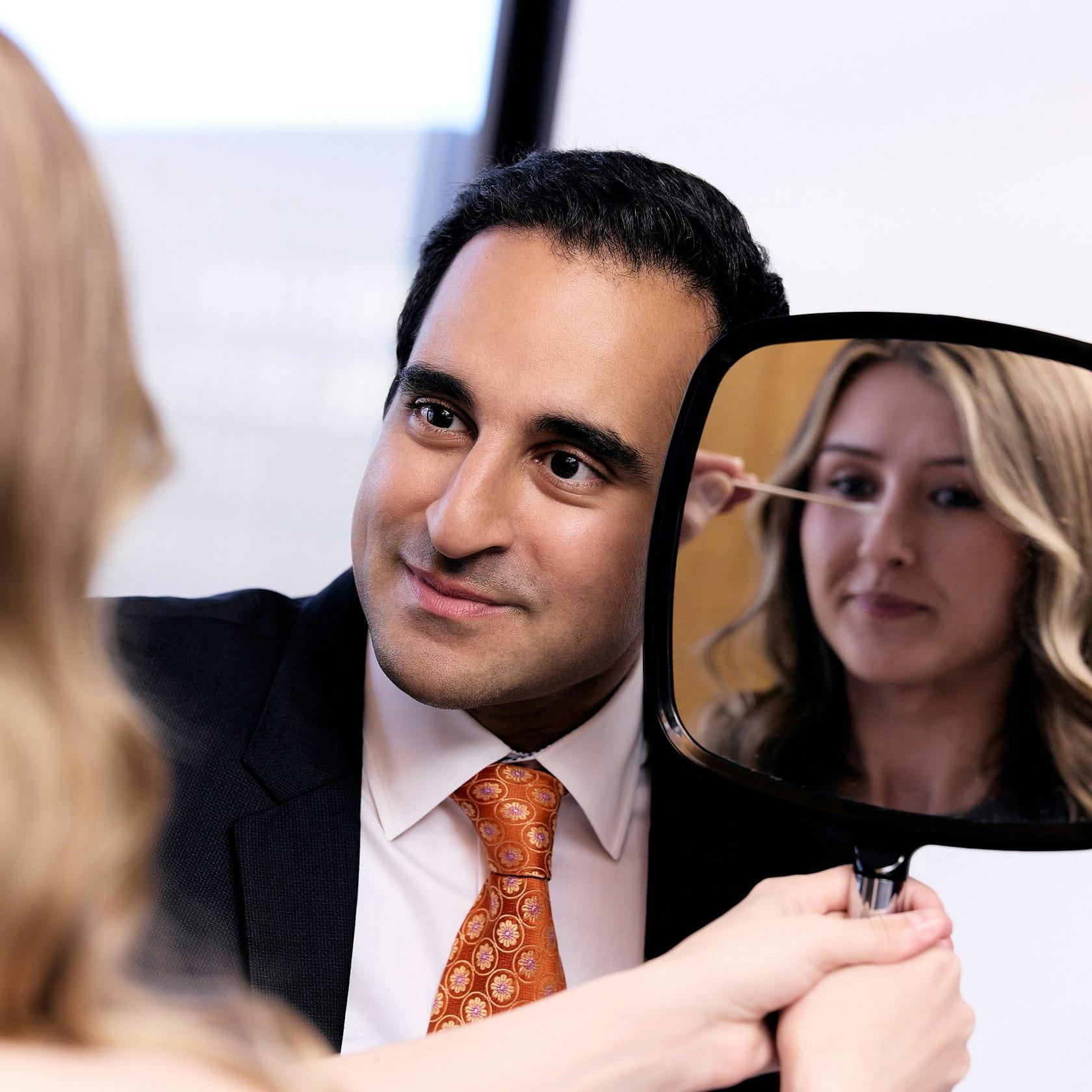 Dr. Dugar checkin a patient