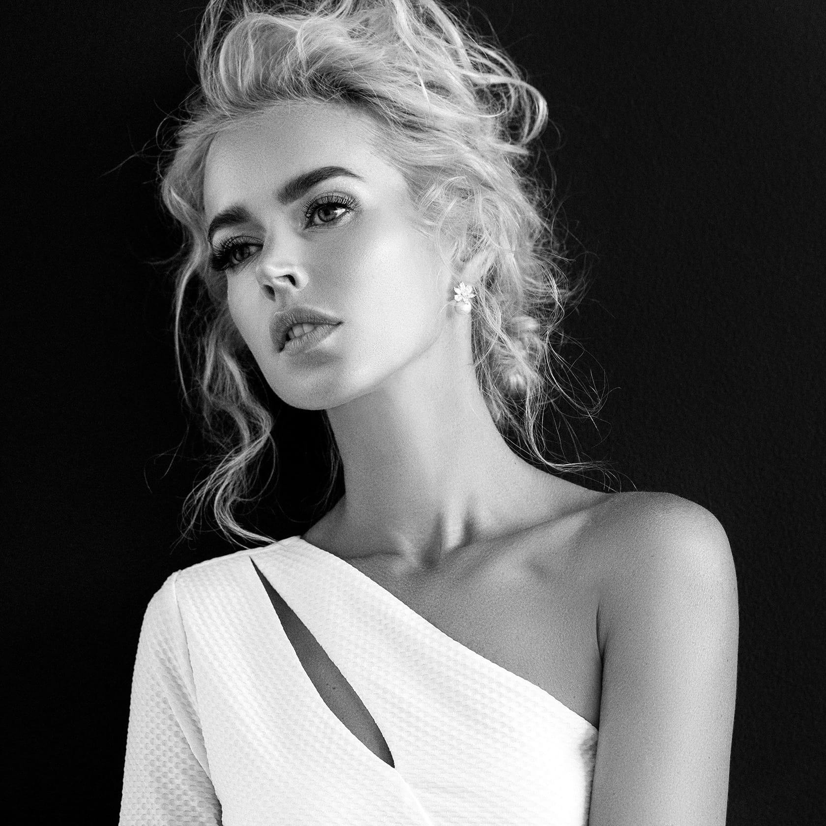 woman in a one shoulder dress