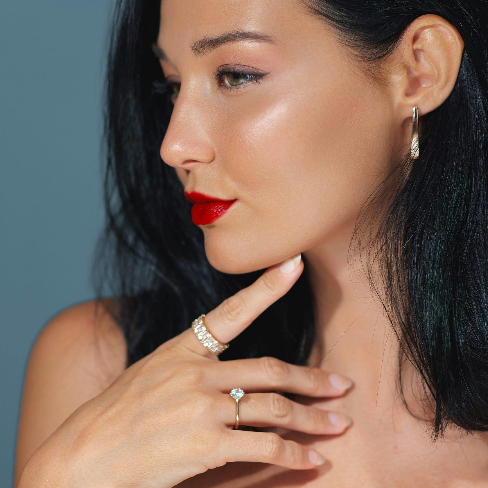 woman touching her chin