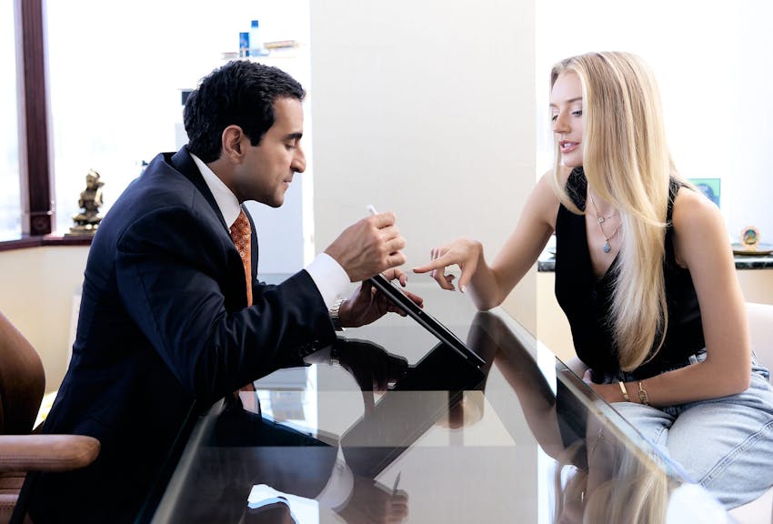 Dr. Dugar consulting a patient