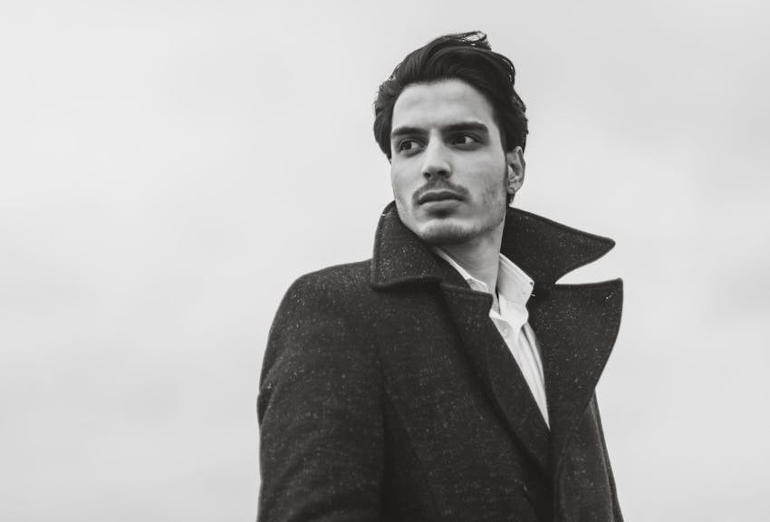 man looking over his shoulder