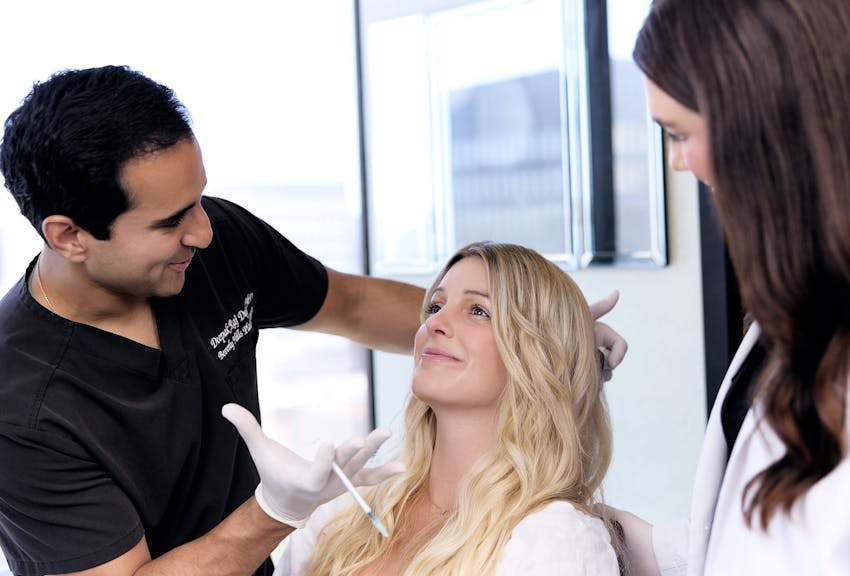 Dr. Dugar giving a patient filler