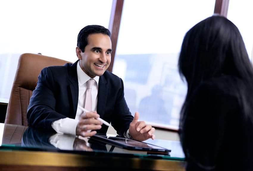Dr. Dugar smiling at a patient